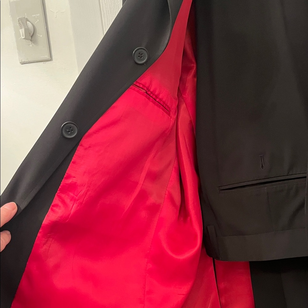 Report Collection men’s suit jacket and matching pants.